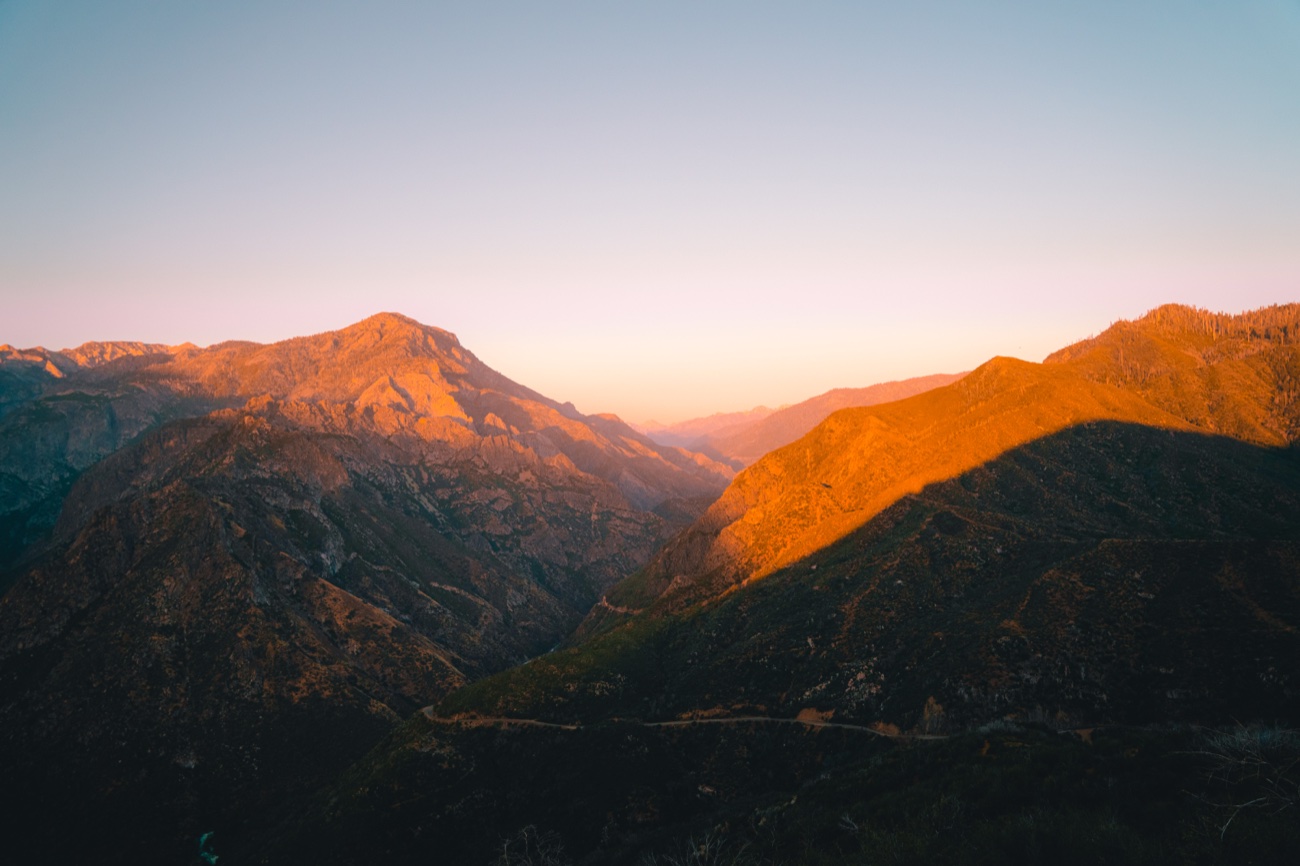 Mountain ridges catching alpenglow at sunset